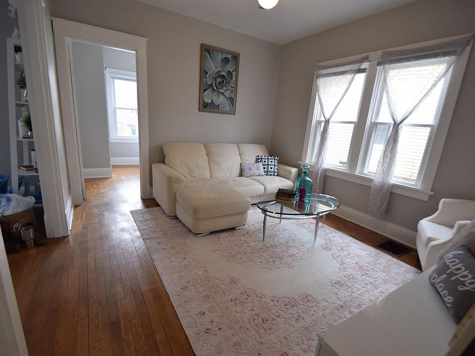 Living room view from kitchen
- door to bedroom is back-left