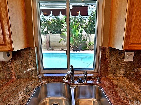 Lovely view of the pool from kitchen sink.