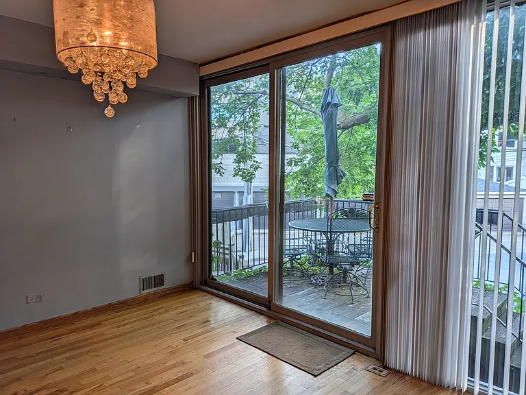 another photo of eat in kitchen and porch/deck, your parking space is directly behind unit