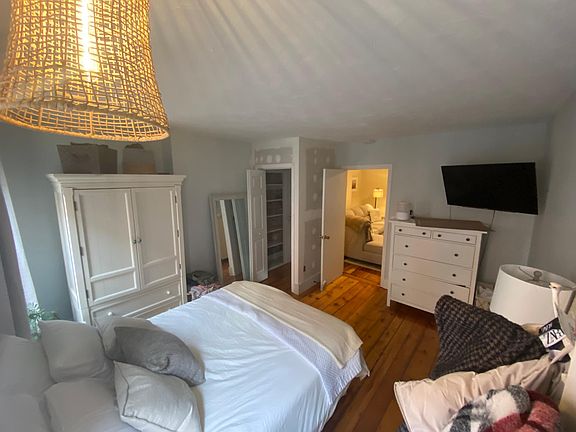 Large Bedroom with wide pine floors