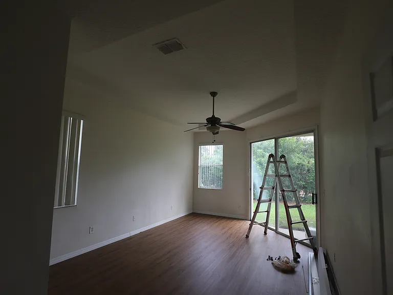 Master bedroom (vertical blind new installation in progress)