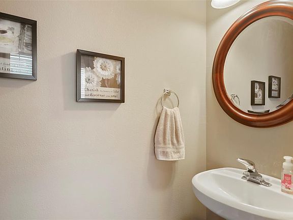 A powder bath is conveniently located just inside the front door in the spacious entry.