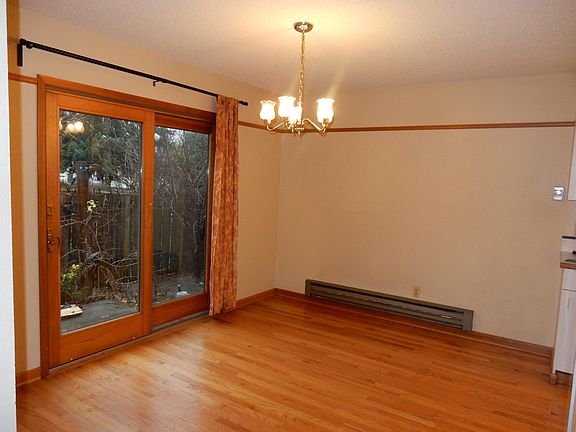 Dining room with sliding glass doors to private patio.