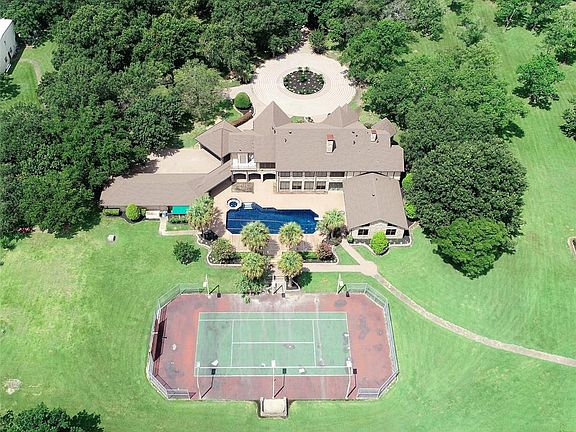 COLOSSAL HOMESITE COMPOUND sits on 2 Acres of the Homesite for your ENJOYMENT!!