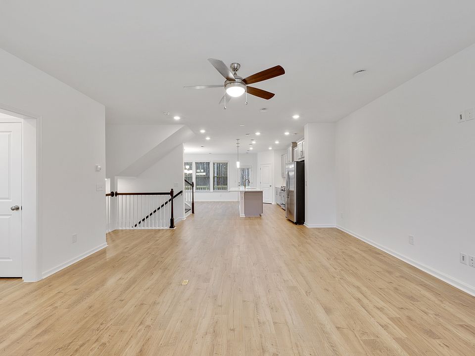 Open Floor Plan. Living Room looking into Ktichen/Dining Area