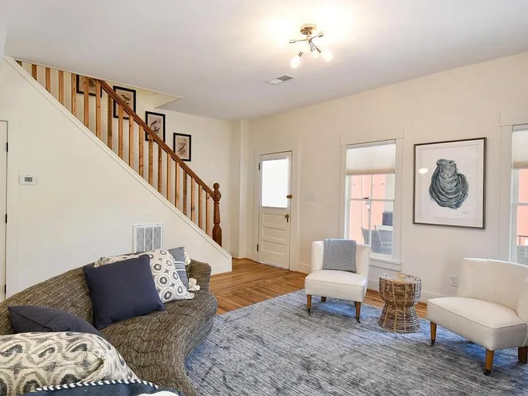 Living room with view of front porch