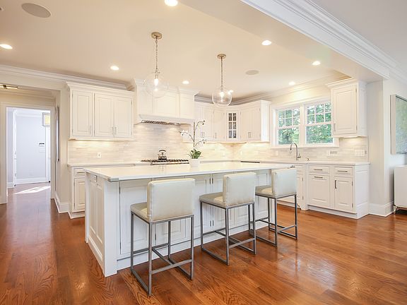 Another view of the modern white kitchen