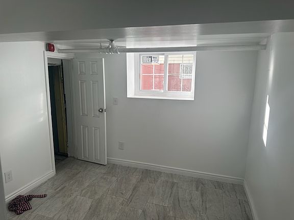 5th image of 826 E 216th St Floor 1