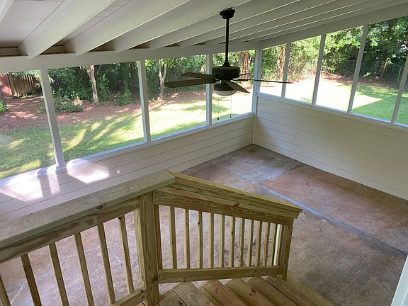 Screened-in back porch