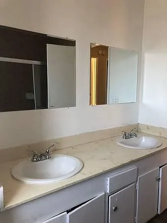 Double sinks. Upstairs bathroom