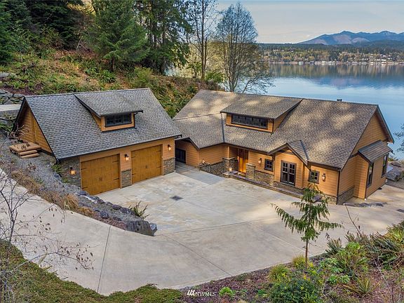 Landscaping that fits the Pacific Northwest plus you have a beautiful custom home.
