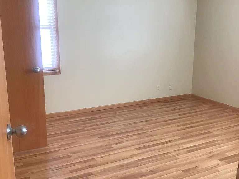 Master bedroom with ceiling fan.