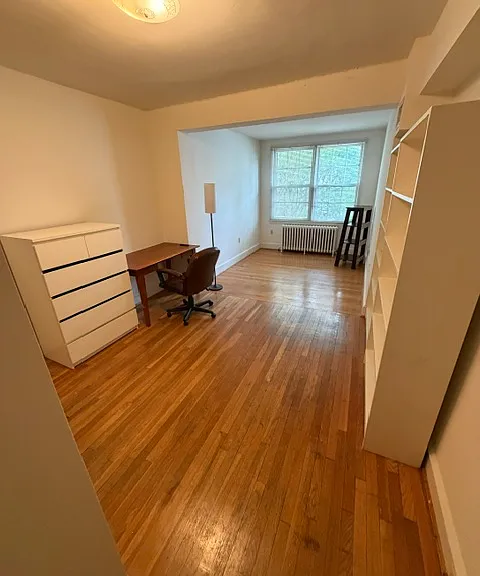 This dresser and desk in one of four bedrooms upstairs can remain for residents' use.