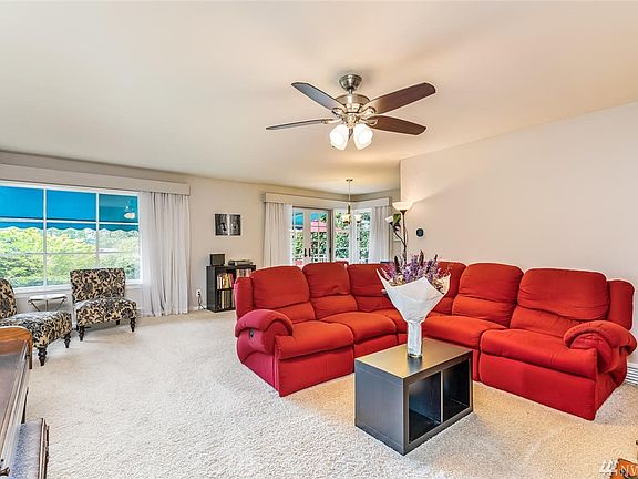 Relax or entertain in your spacious living and dining room with an abundance of windows that flood this space with light. Ceiling fan for added comfort.