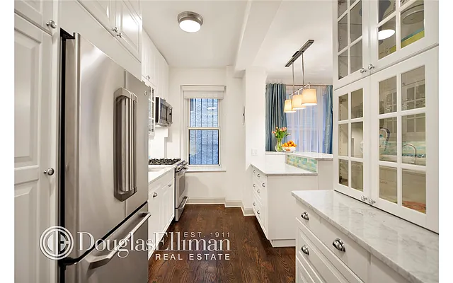 Sold by Douglas Elliman | media 12