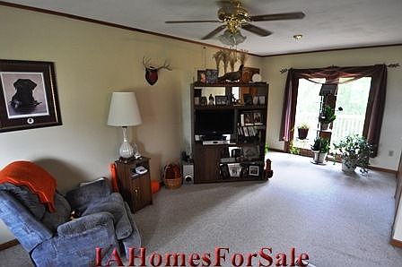 Living Room with additional french doors to deck and closet space on the right wall.