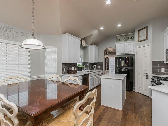 And the star of the show!   Kitchen was literally just finished.   To compliment the elegant hardwood floors, the cabinets have been refinished a stylish white, stunning upgrade Quartz counters have been installed as well as a smokey grey subway tile backsplash to compliment it all.   Dishes will be a breeze in the new stainless steel sink as well.