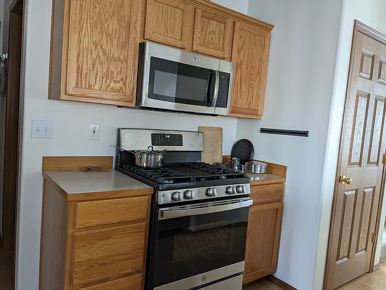 Brand new gas cooking range and microwave oven