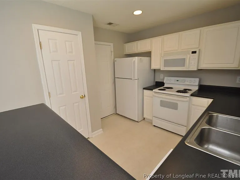 5909 Rivercliff Ct — Photo 7