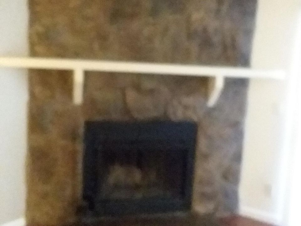 wood fireplace in livingroom
