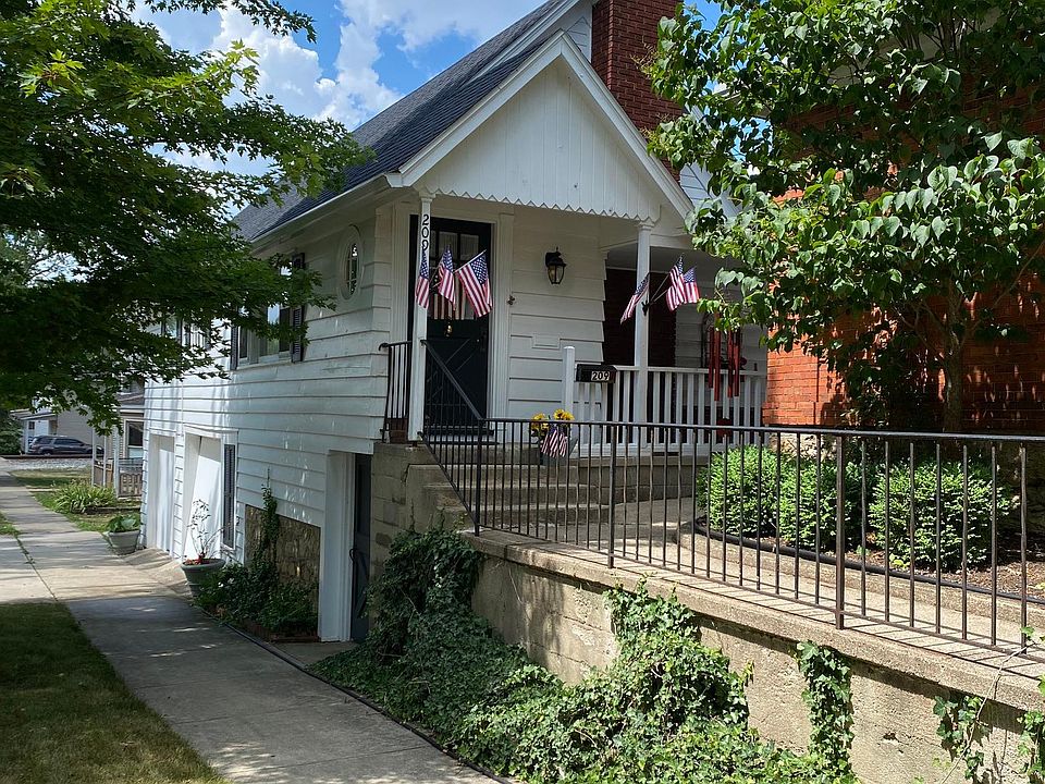 Front entrance with 2-car garage or storage.