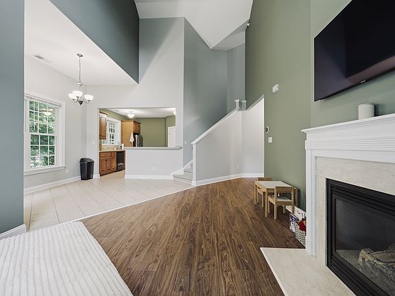 Open living and dining area connects to kitchen