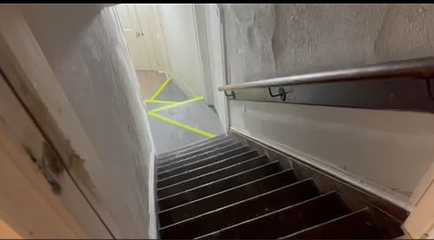 Stairs into the upstairs unit