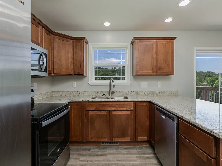 Granite countertops; stainless steel appliances