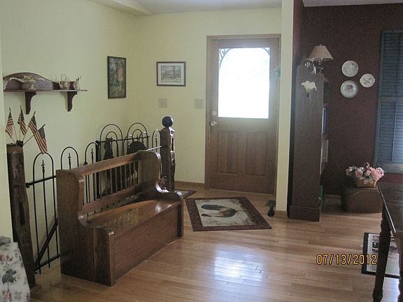 Front entry w iron railing