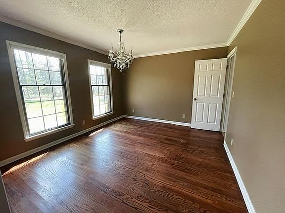 Dining room with door to kitchen