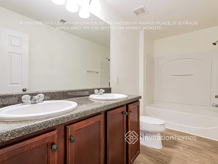 2828 Farmstead Ct — Photo 17