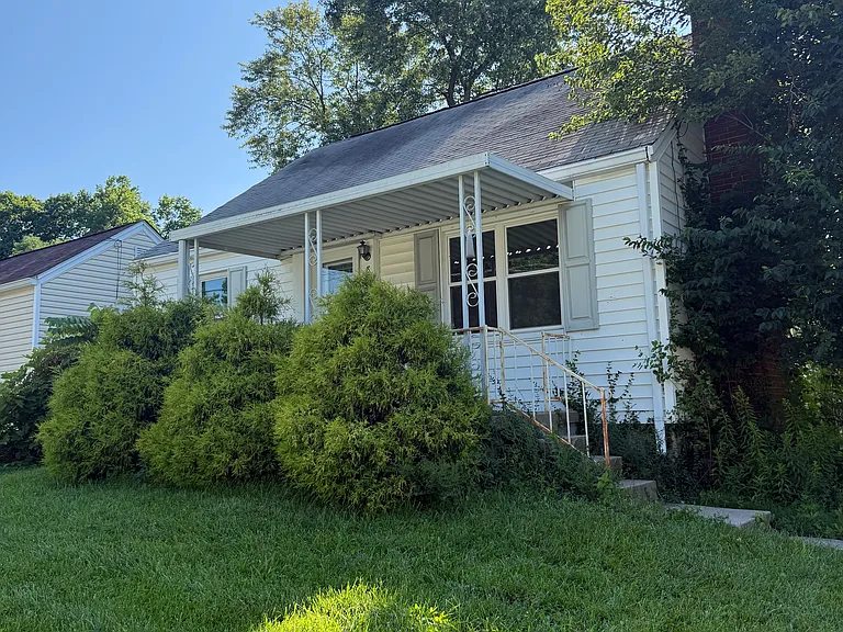 8323 Saint Clair Ave — Photo 1