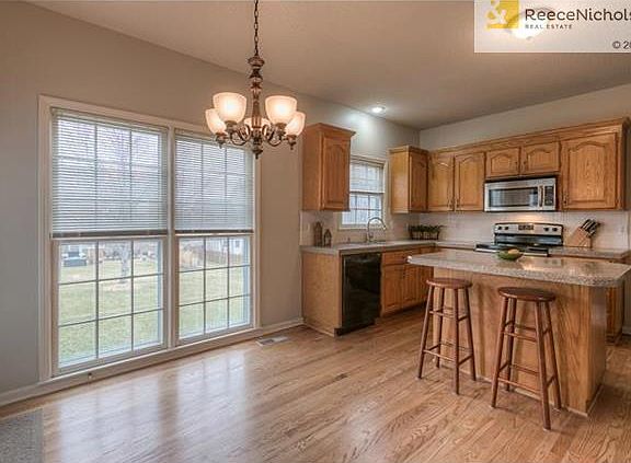 Newly refinished hardwoods, granite transformation counters, two new stainless steel appliances and refrigerator that stays with the home.