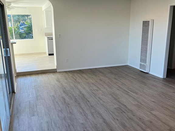 Living room looking into dining room.