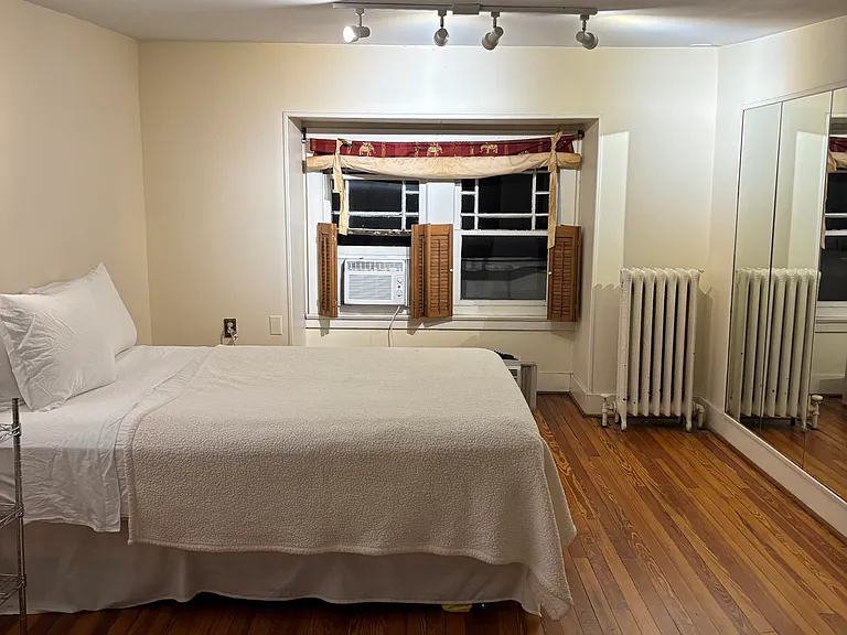 Large third floor bedroom with full bed