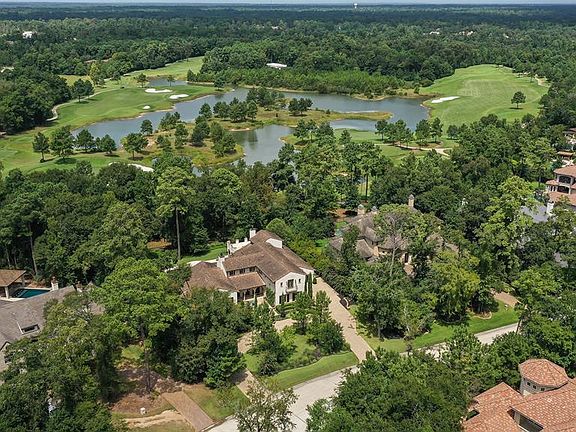 Aerial of approximately 3/4 acre with views of lakes and 3 holes