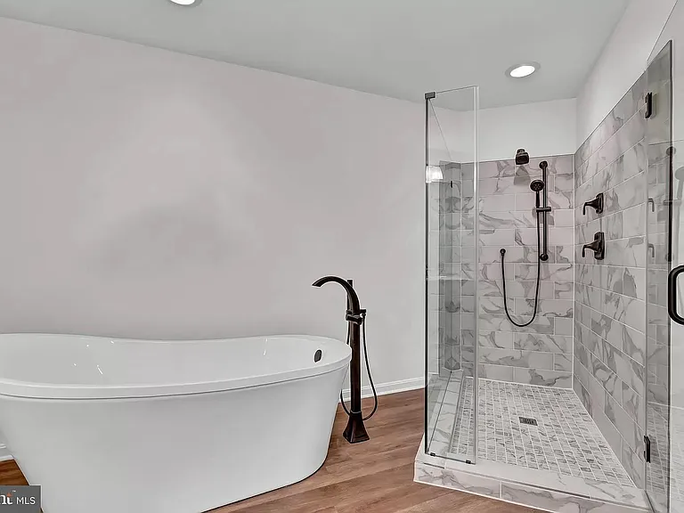Master Bath with modern Tub and Standing Shower