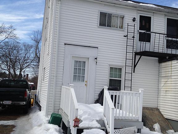 Rear of building with private deck