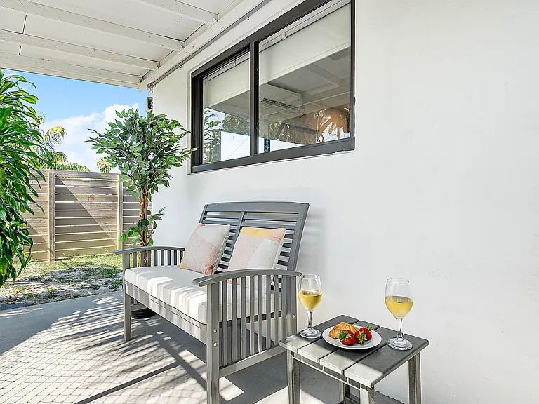 Cozy outdoor nook with seating_perfect for morning coffee or evening wine.