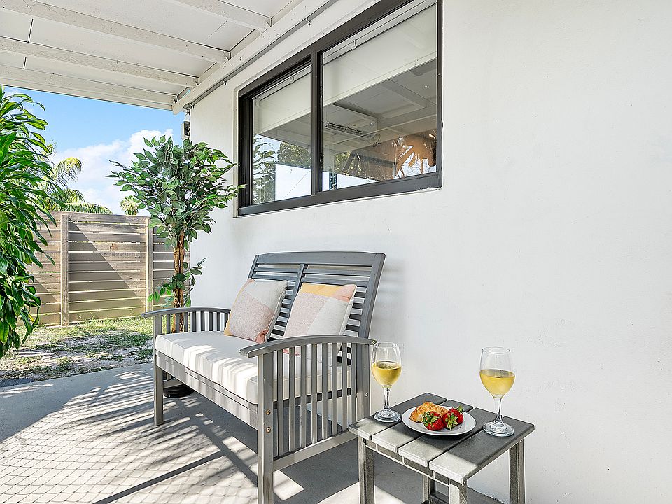 Cozy outdoor nook with seating_perfect for morning coffee or evening wine.