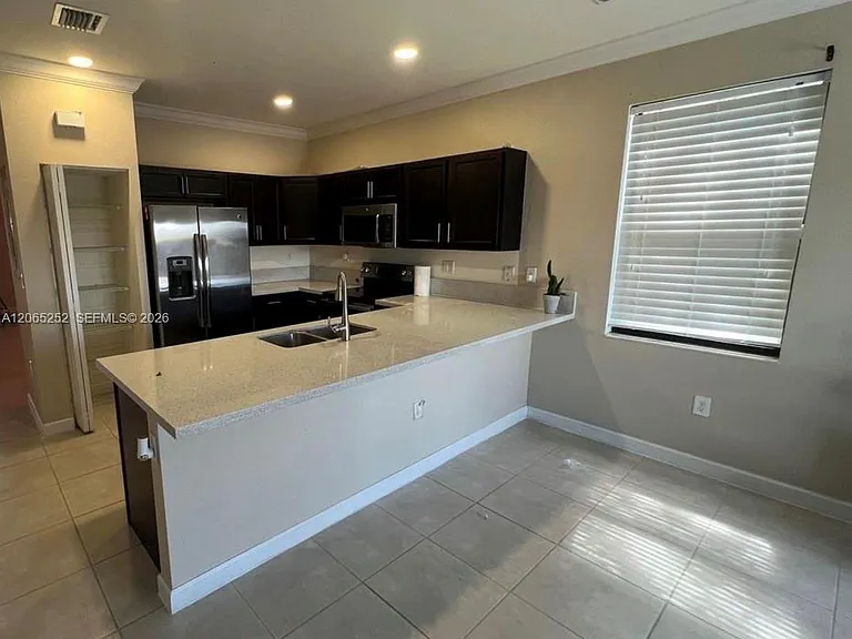 11561 SW 248th Ter #11561 — Photo 8