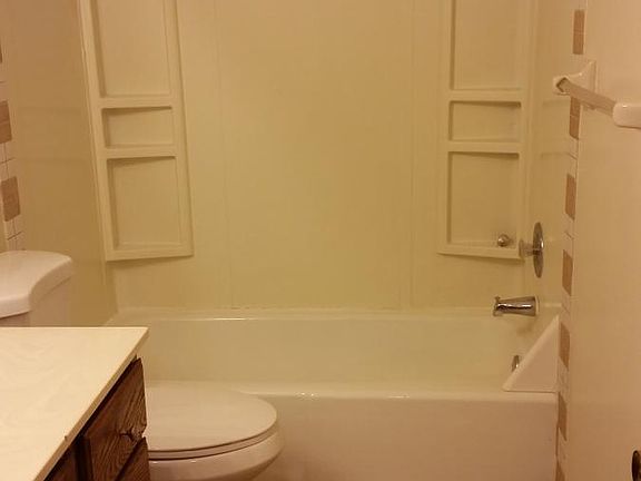 New flooring and toilet in the upstairs bathroom