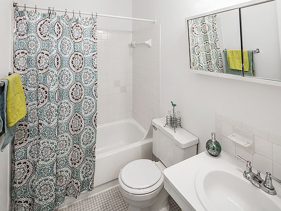 Vibrant Tiled Bathroom; Warren Club in Warren, MI