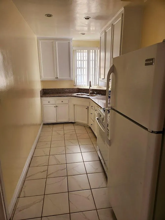 7357 Woodman Ave — Photo 3
