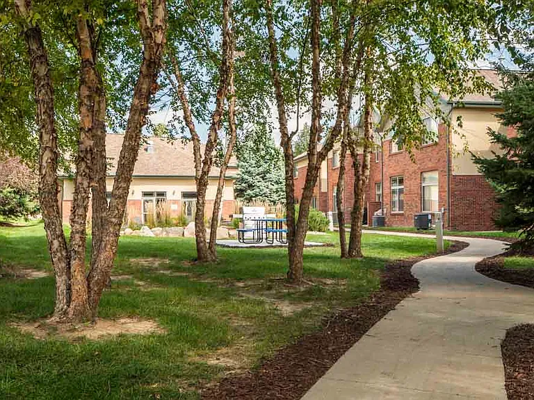 You'll love the walking path through our community adorned with mature trees and beautiful landscaping.