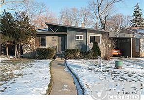 Spacious, 3-bedroom, 1 1/2 baths, brick home, with carport