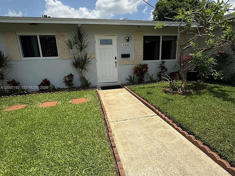 5431 NW 17th Ct — Photo 1