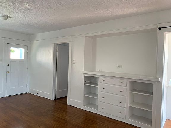Book/ storage and TV center.