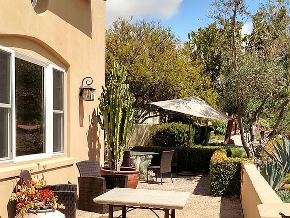 FRONT TERRACE SEATING and DINING AREAS LOOKING ONTO WEST and