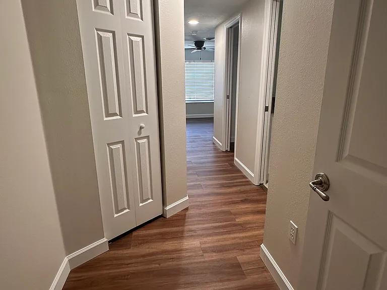 Separate hallway leading to the master suite. Walk in and close out the world behind you